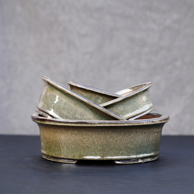 How does the Purple Sand Glaze Bonsai Pot achieve both internal and external perfection?